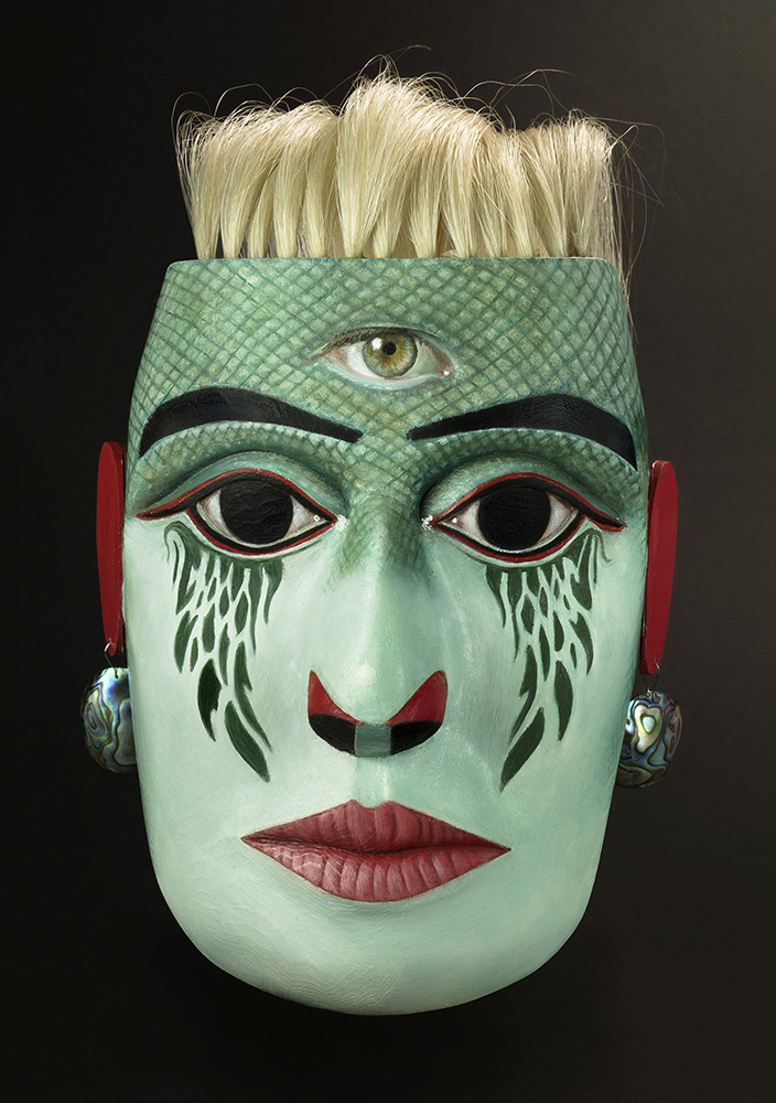 Metamorphosis/ Tlayilela Mask Rande Cook and Carollyne Yardley Cedar, acrylic, oil, abalone, horsehair, 10” x 8” x 6” Photo credit: Terry Zlot