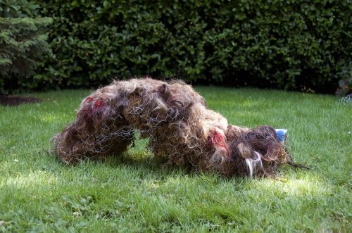 Remnants 2, from Pandemic Sculpture Garden, 2020 Moss, chicken wire, used nitrile examination gloves, human hair, 32″ x 12″ x 10”