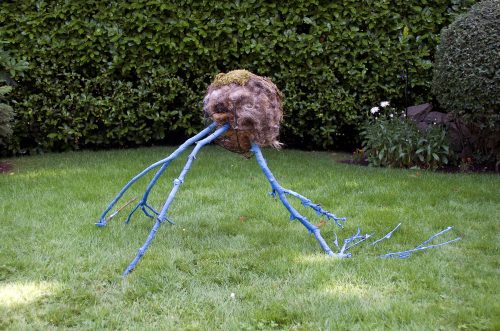 Remnants 3, from Pandemic Sculpture Garden, 2020 Moss, metal hanging basket planter with coconut coir liner, pruned branches, used nitrile examination gloves, human hair, 55″ x 29″ x33”