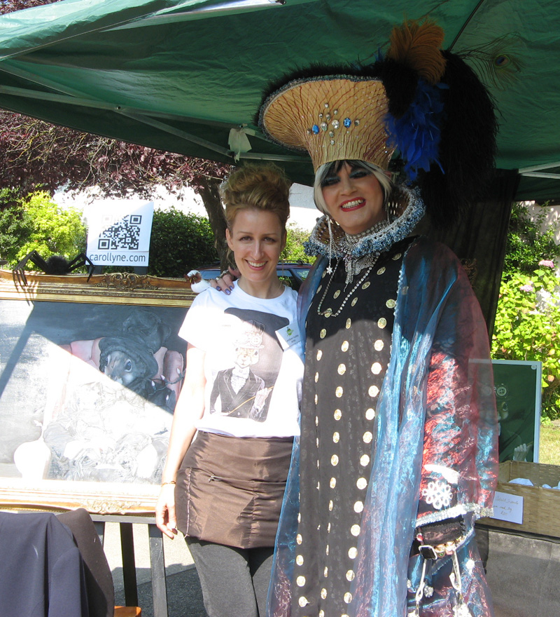 Carollyne Yardley with Dame Mailarta at the TD Art Gallery of Greater Victoria's Moss Street Paint In, 2012 Photo by Courtney Graham
