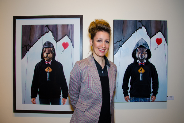 Carollyne Yardley in front of her artwork. Photo by Matthew Schlauch, Snapd Magazine, Dec 2013. Carollyne Yardley in front of her artwork. Photo by Matthew Schlauch, Snapd Magazine, Dec 2013.