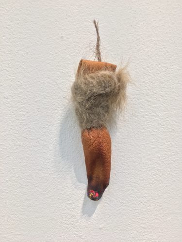 Holobionts 11 (detail). Squirrel hair, cat hair, magnolia petals, leaf skeleton, human hair, 30% wood fibre acrylic, wax, feather, oak tree branch, acorns, 2019.